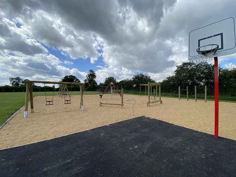 Dedicated children's play area and 5 acre sports field